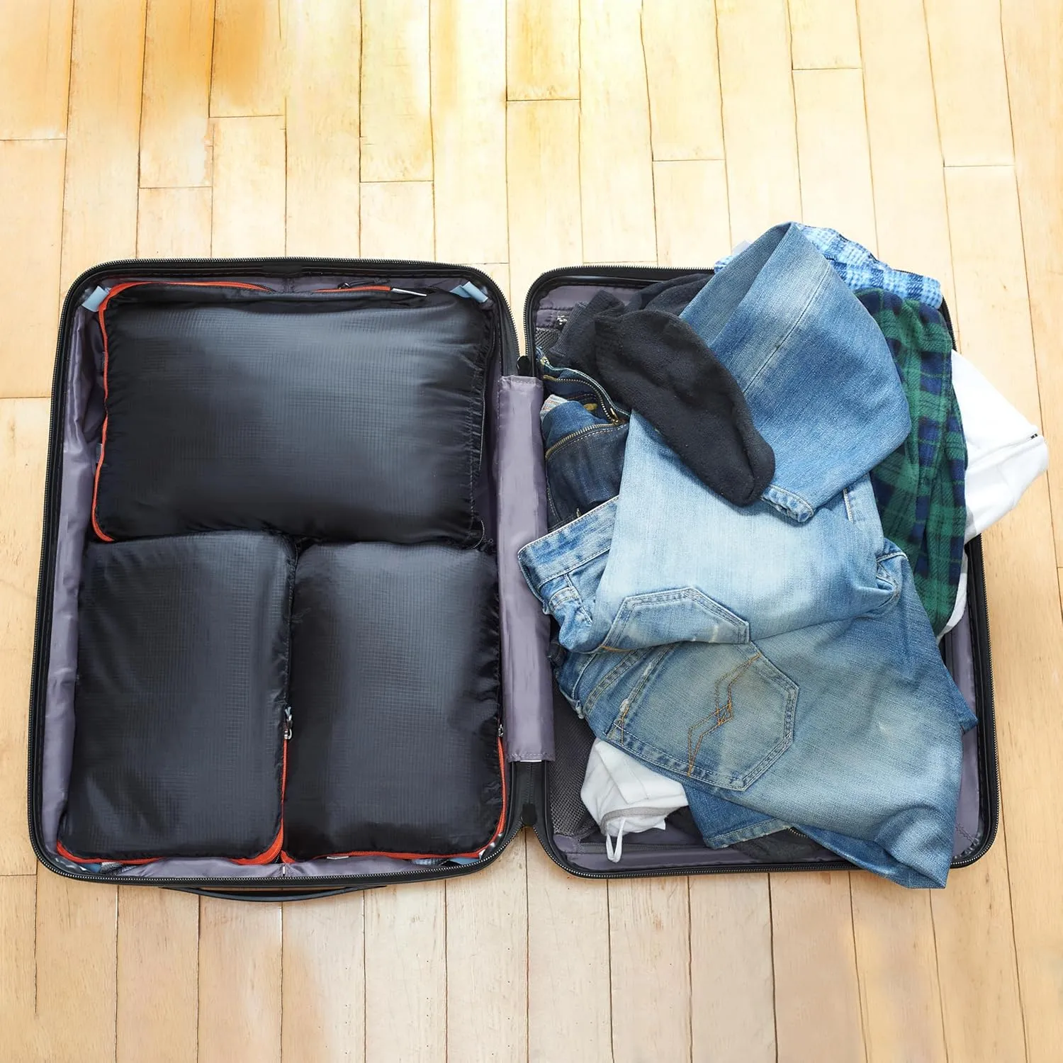 Black compression packing cubes for suitcases. Travel compression storage organiser bags