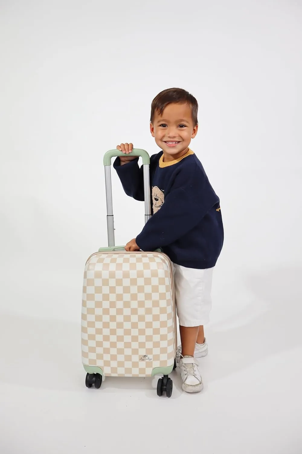 Itzy Ritzy Toddler Suitcase with Adjustable Handle, 360-Degree Spinner Wheels, 2 Interior Compartments and Hard Shell Design; Perfect Kids Luggage with Wheels for Ages 3 and Up (Checkerboard)