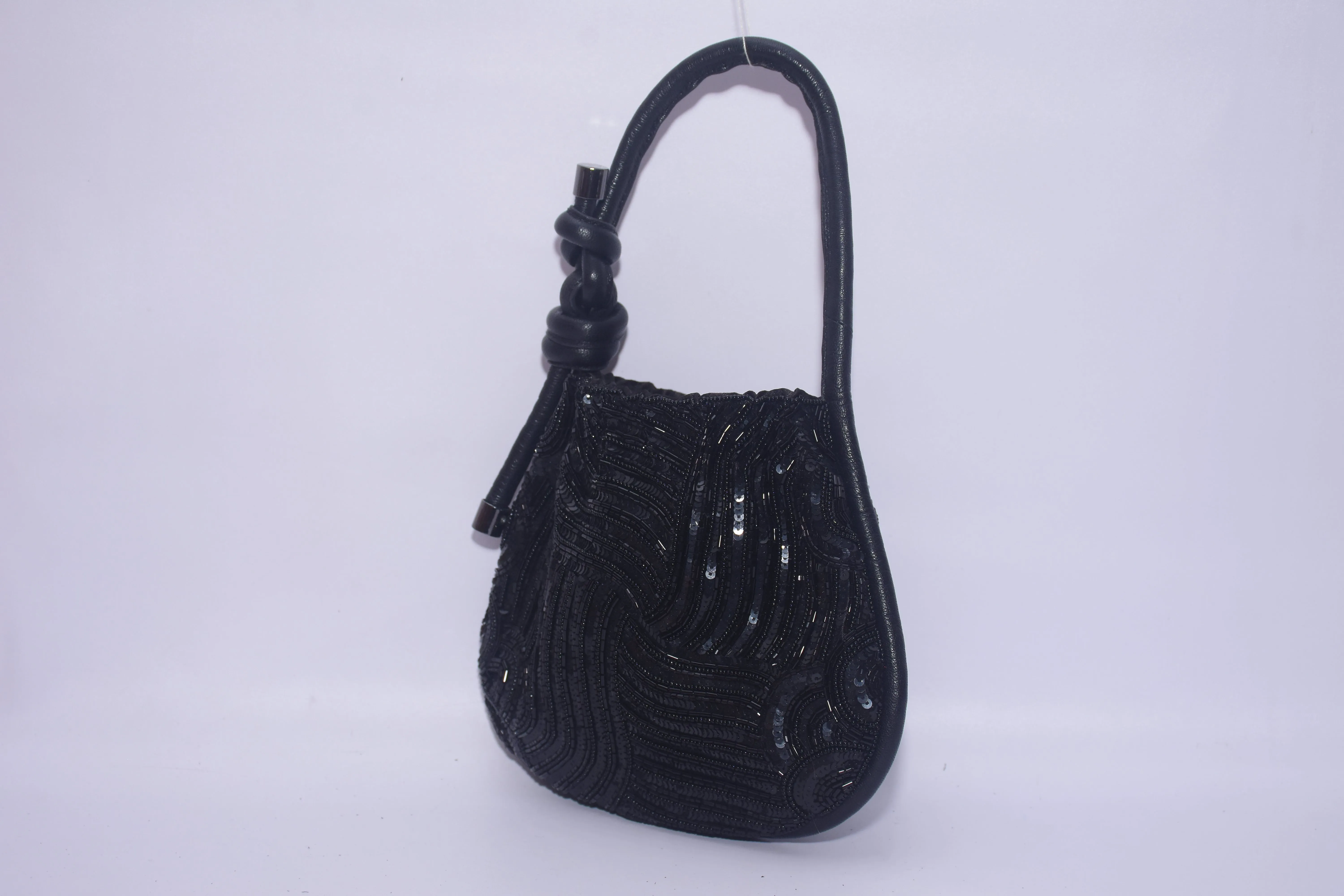 KNOTTED SEQUINNED PURSE