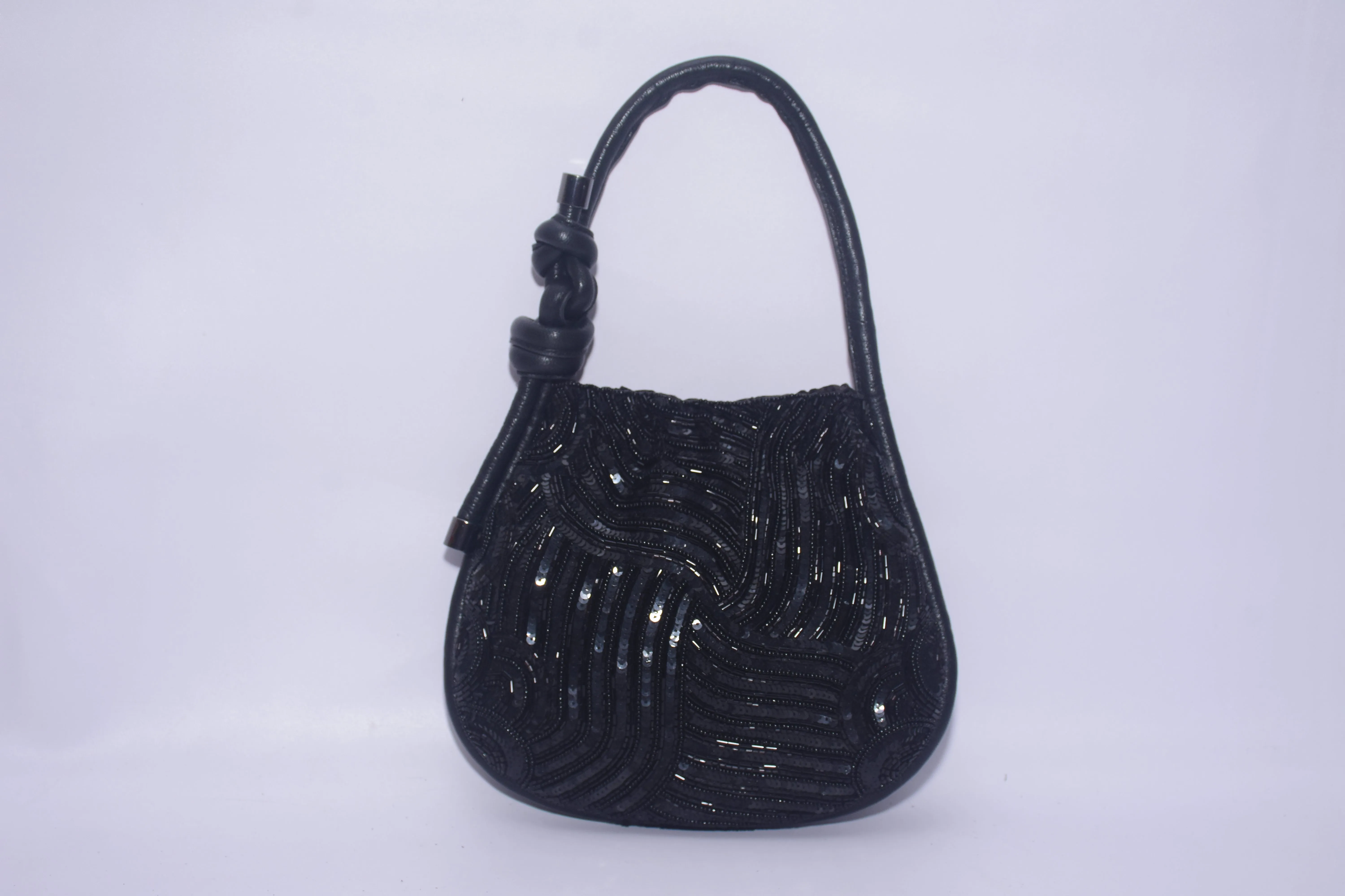 KNOTTED SEQUINNED PURSE
